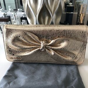 St. John gold handbag